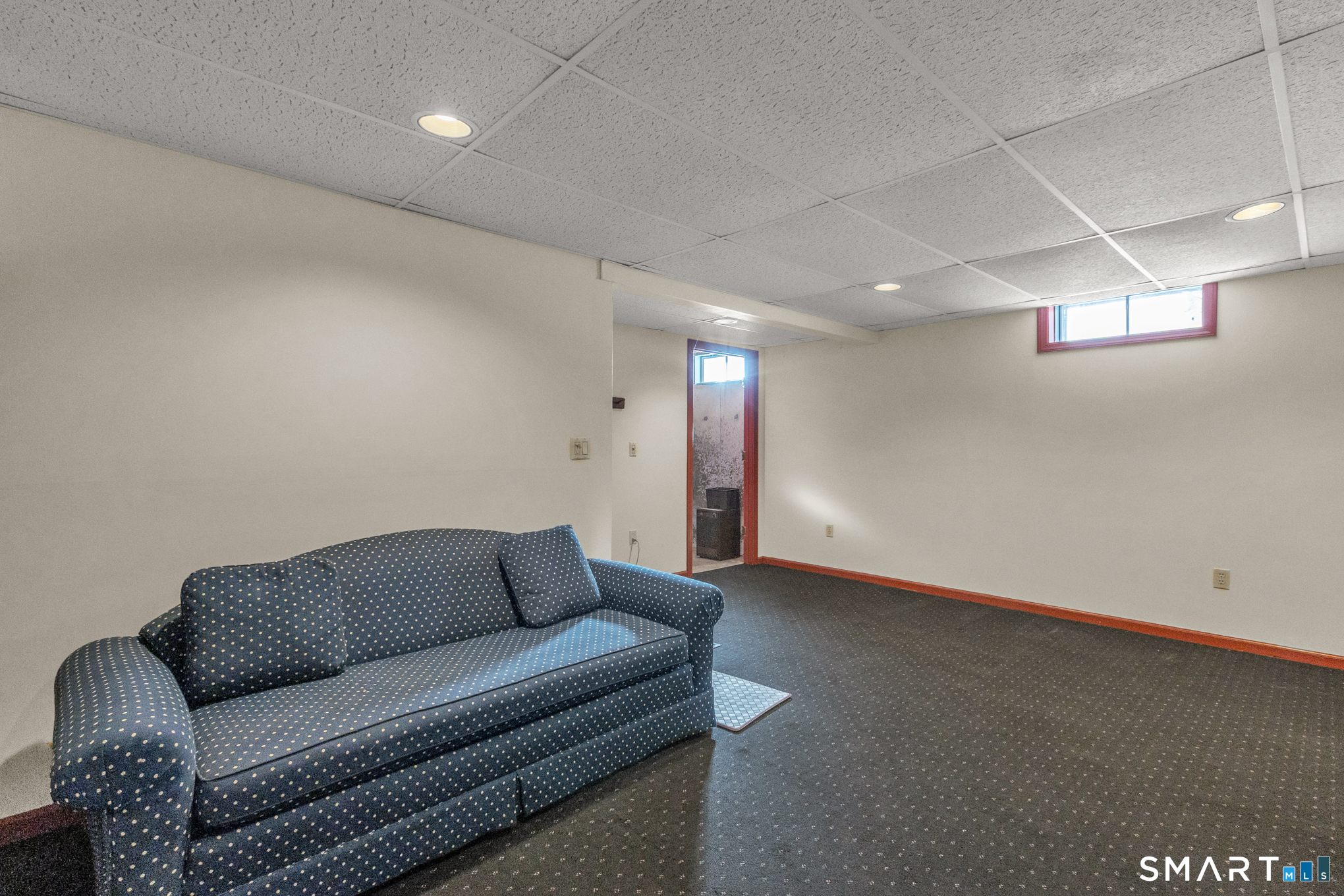 550 High Street Coventry, CT 06238 - Photo 33 of 35 a living room with furniture and a couch