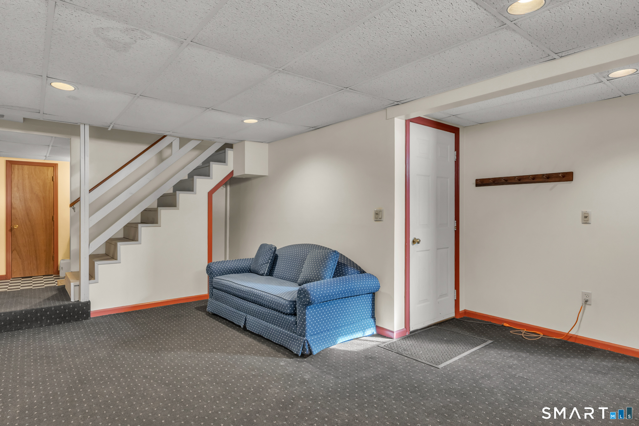 550 High Street Coventry, CT 06238 - Photo 34 of 35 a living room with furniture and stairs