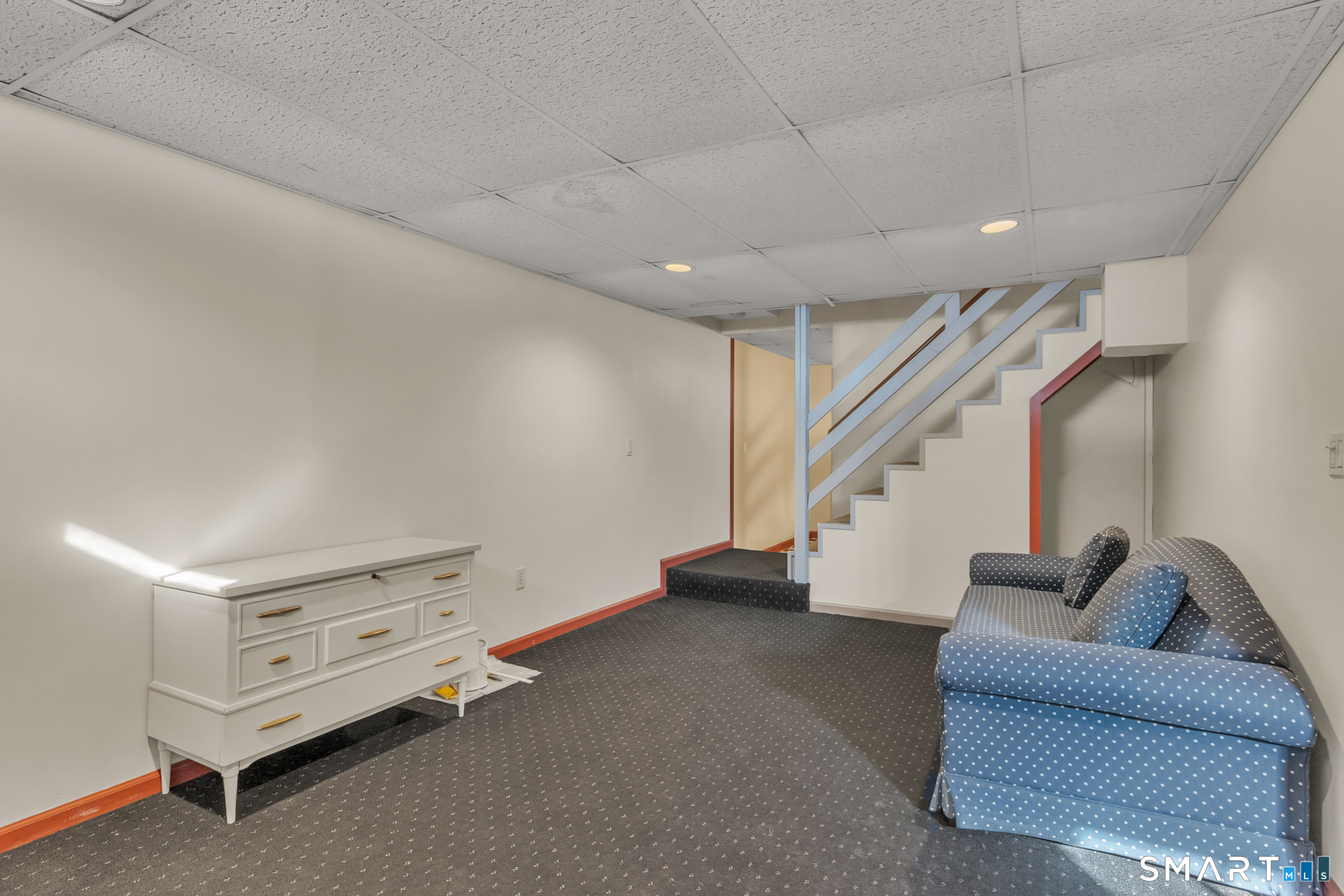 550 High Street Coventry, CT 06238 - Photo 35 of 35 a living room with furniture and stairs