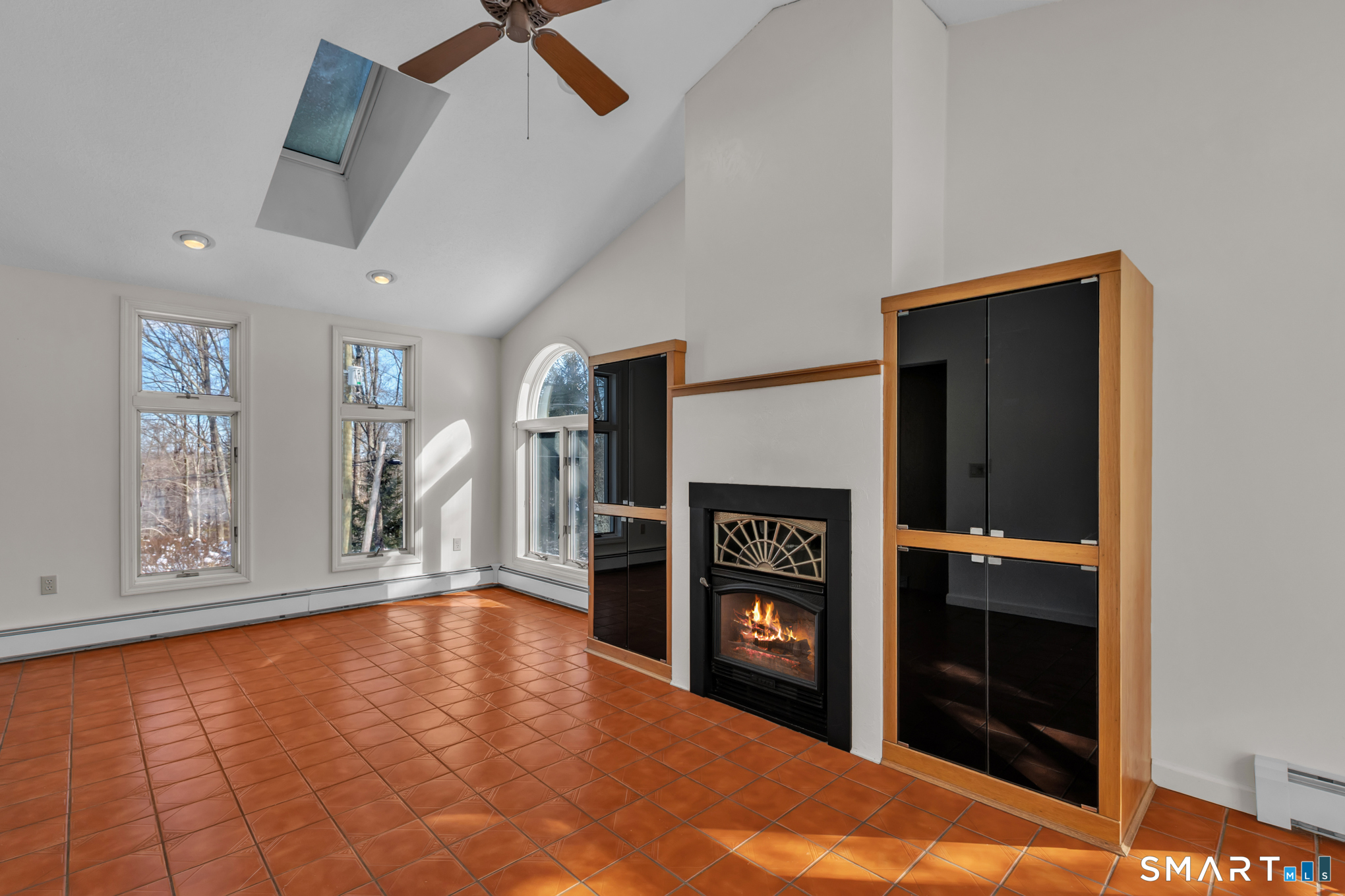 550 High Street Coventry, CT 06238 - Photo 9 of 35 a view of a livingroom with a fireplace