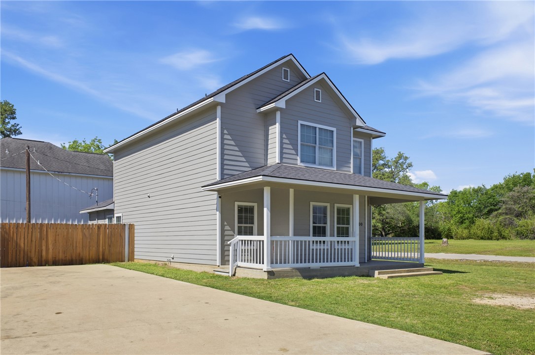4400 Milam Street Bryan, TX 77801 - Photo 23 of 25 a front view of a house with a yard