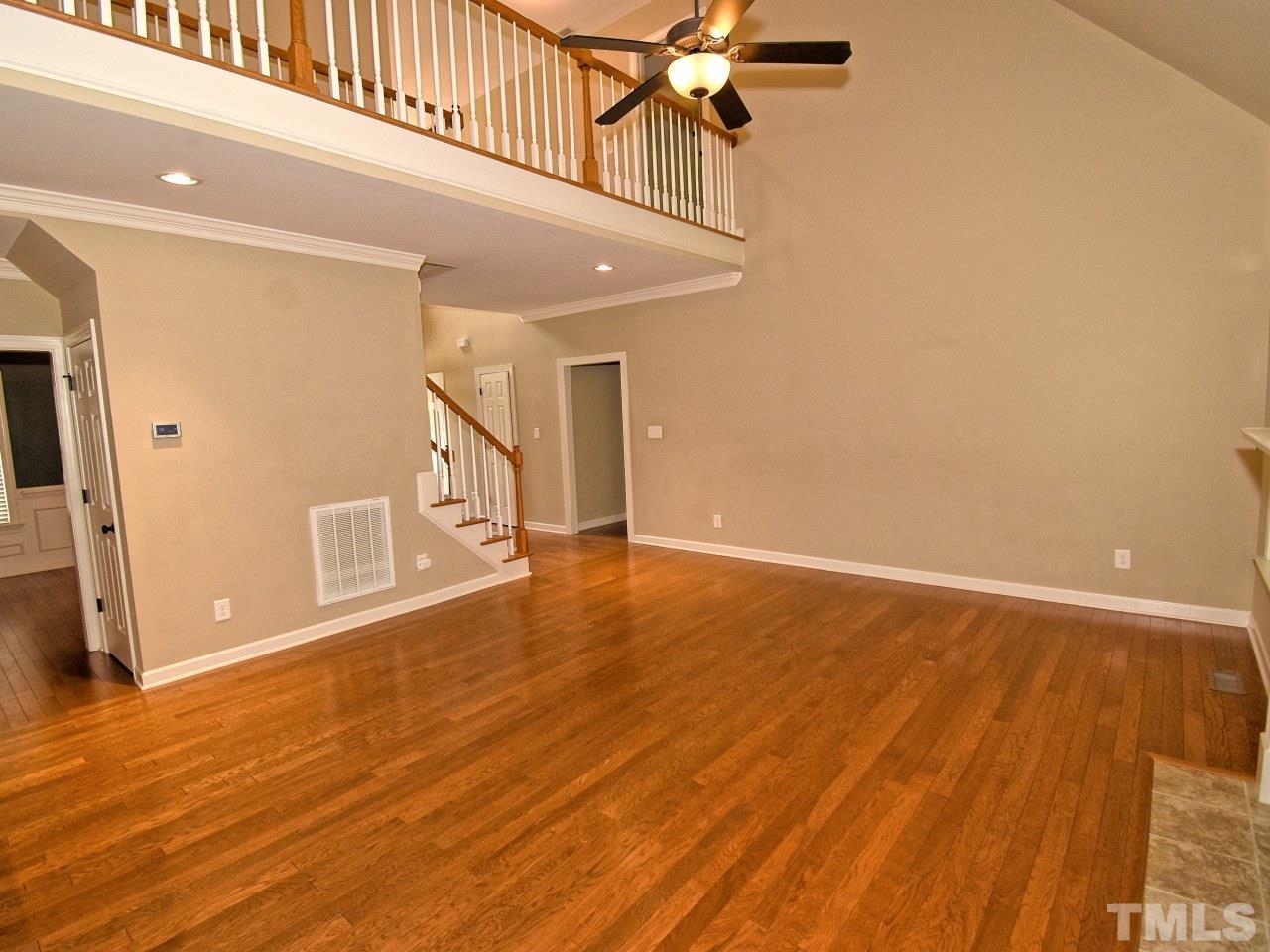 64 Hackney Trail Clayton, NC 27527 - Photo 10 of 30 a view of an entryway with wooden floor