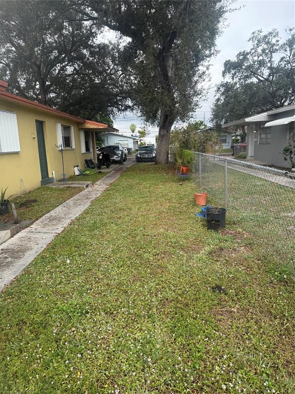 5738 Lincoln Street, Unit B Hollywood, FL 33021 - Photo 11 of 25 a view of a backyard with a garden