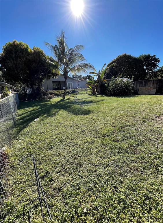 5738 Lincoln Street, Unit B Hollywood, FL 33021 - Photo 5 of 25 a view of a garden