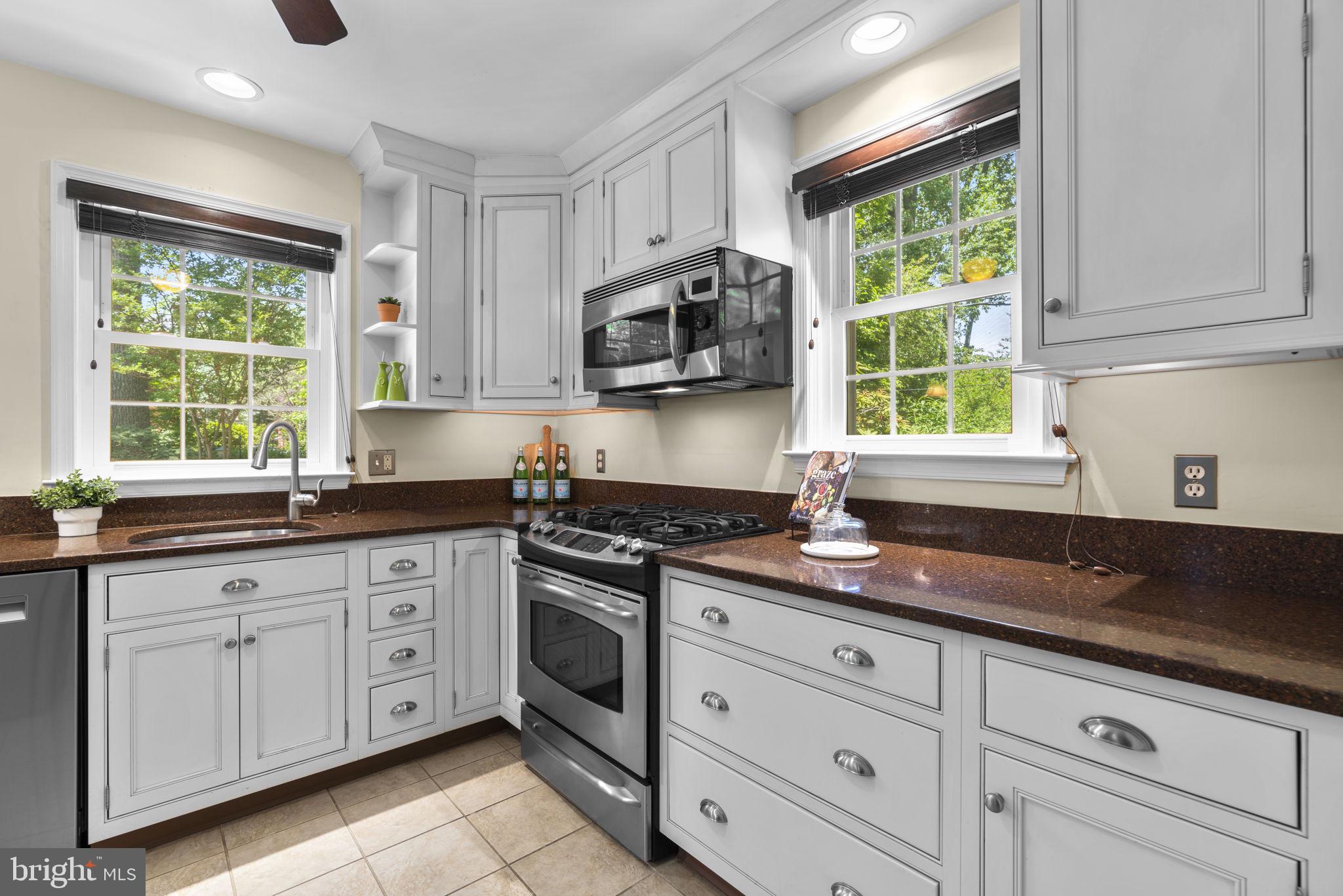 28 Dunmore Road Baltimore, MD 21228 - Photo 13 of 54 Under-cabinet lighting makes meal prep easier
