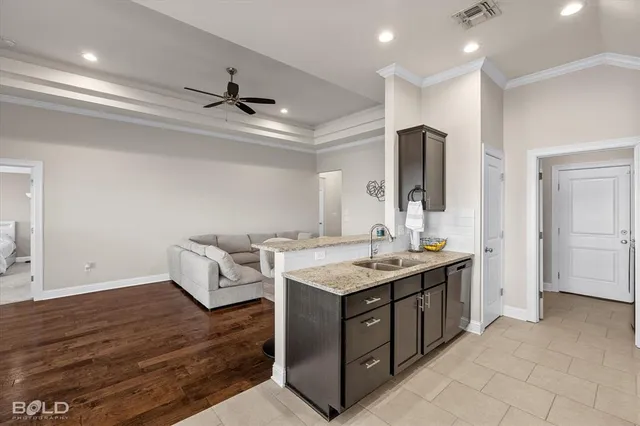a view of a house with a yard and garage