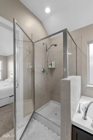 a bathroom with a bathtub and a sink