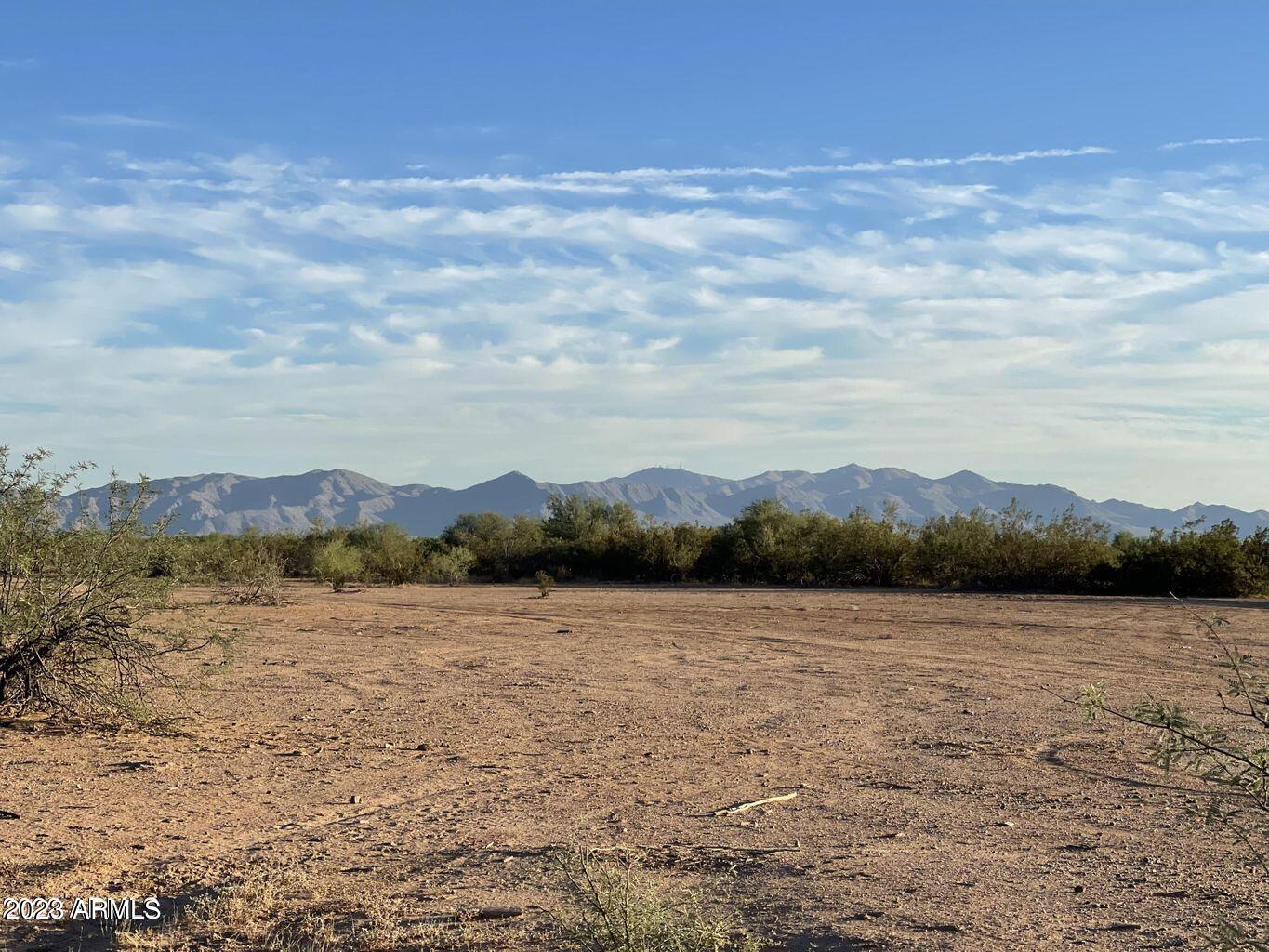 0 West Lone Mountain Road, Unit 4 Wittmann, AZ 85361 - Photo 1 of 27 a view of lake with mountain