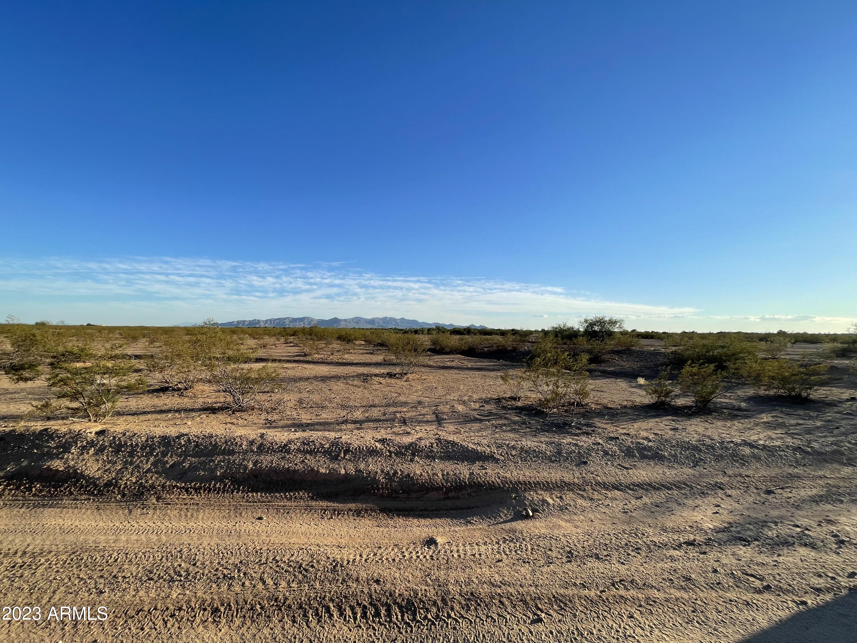 0 West Lone Mountain Road, Unit 4 Wittmann, AZ 85361 - Photo 8 of 27 a view of an ocean beach
