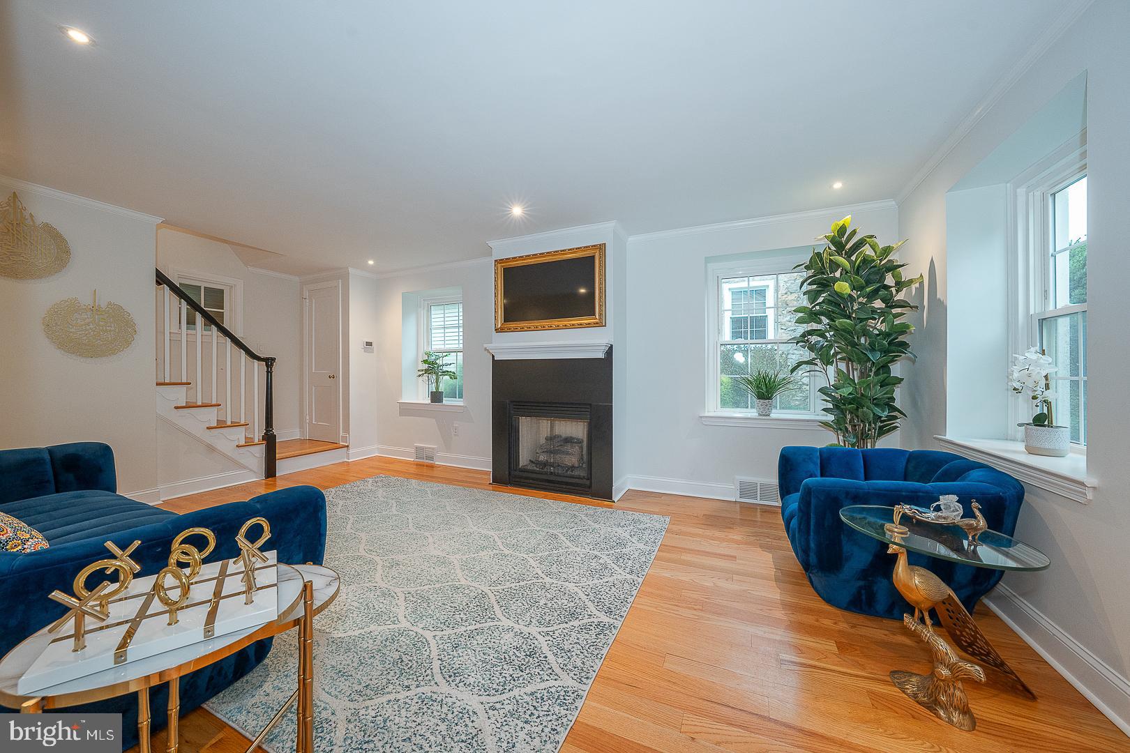 220 Dorset Road Devon, PA 19333 - Photo 5 of 32 a living room with furniture and a fireplace