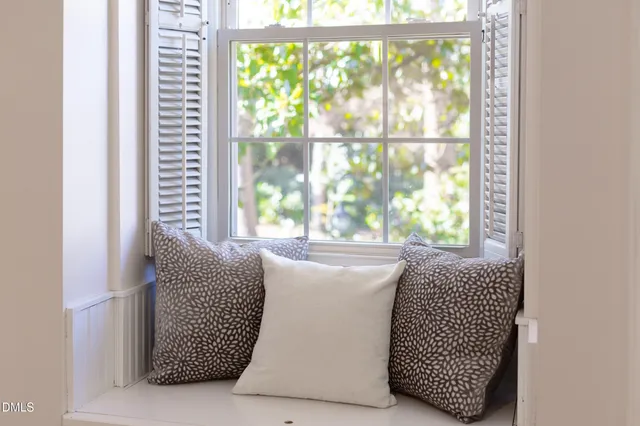 a view of a livingroom with furniture and wooden floor