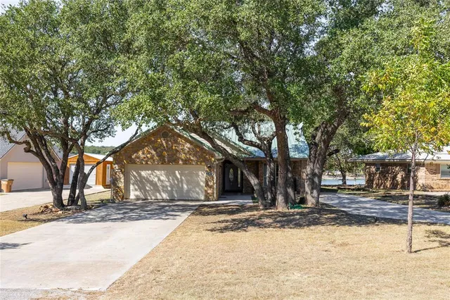 a view of snow on the side of a road