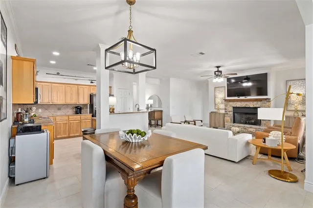 a view of a livingroom with furniture and a kitchen