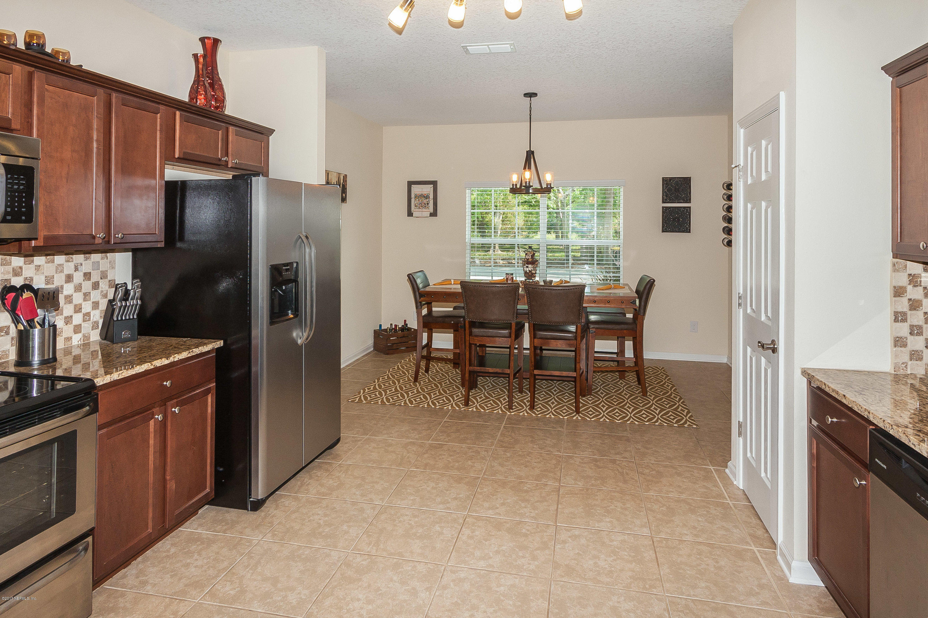 13695 Macapa Road Jacksonville, FL 32224 - Photo 16 of 29 Kitchen to Dining