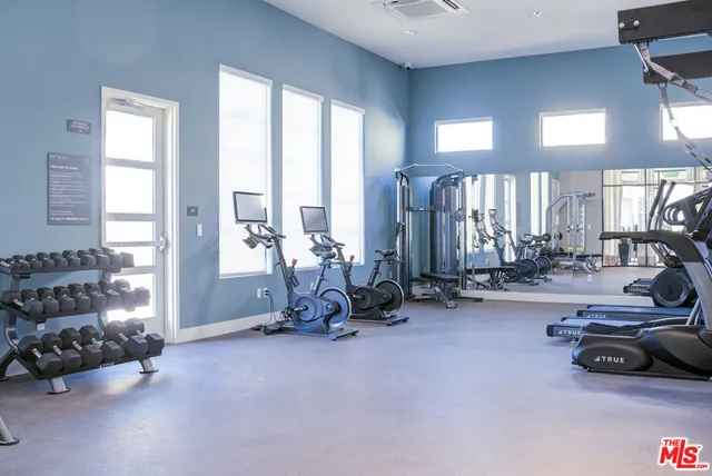 a view of a room with gym equipment