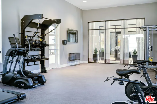 a view of a room with gym equipment