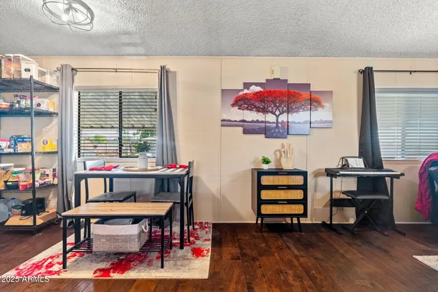 a view of a workspace with furniture and toys