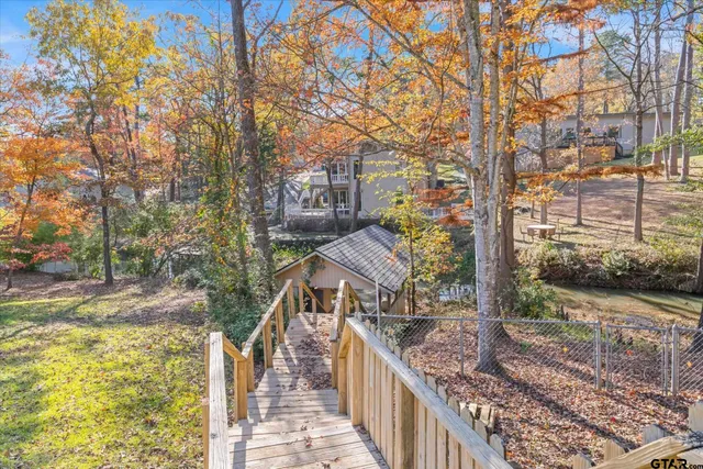 a backyard of a house with lots of green space