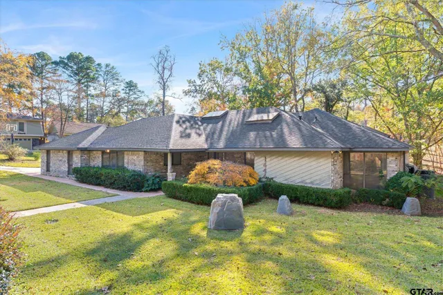 a view of a porch and garden