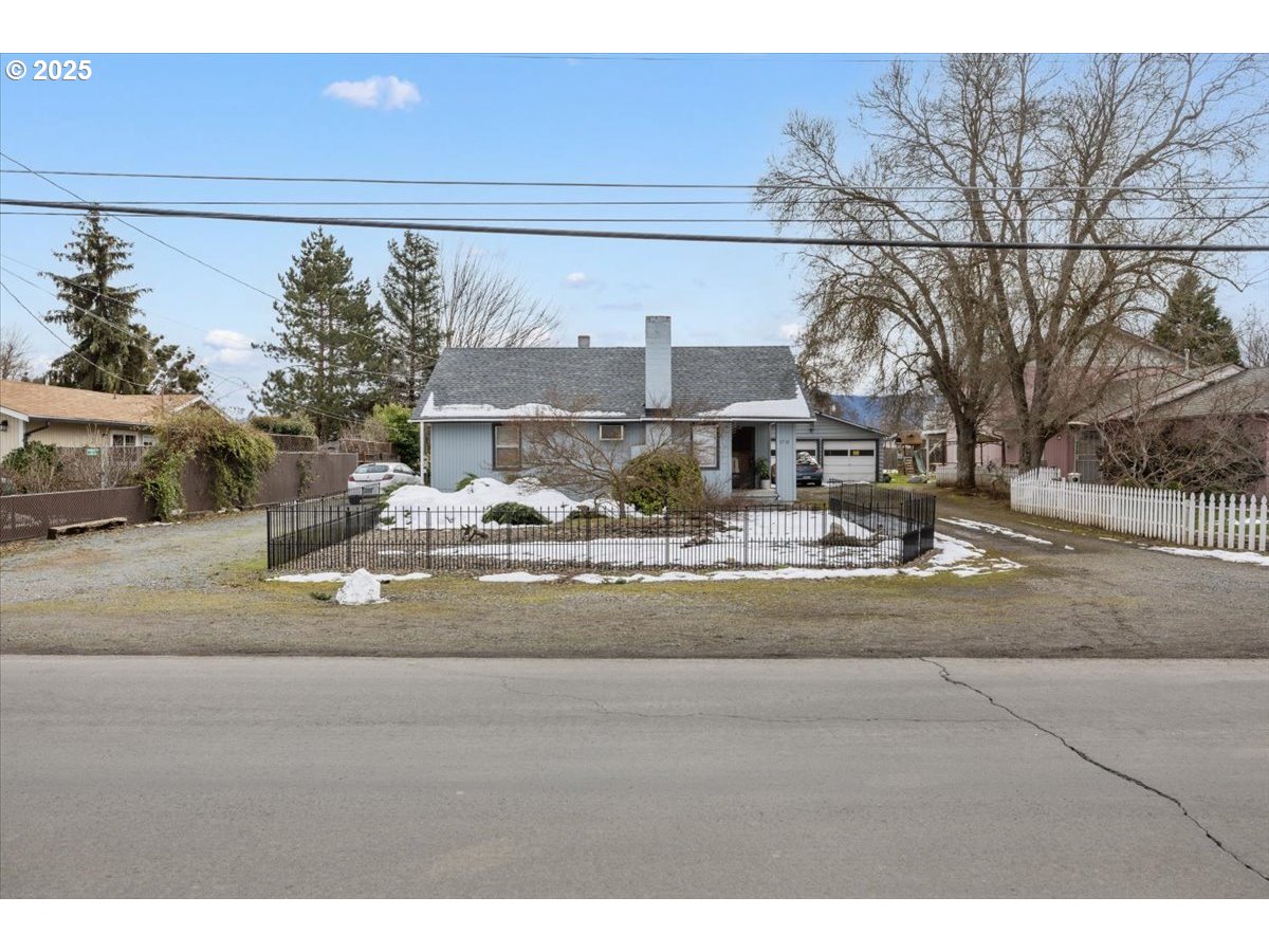 1711 Prune Street Medford, OR 97501 - Photo 1 of 28 a view of a building with a street