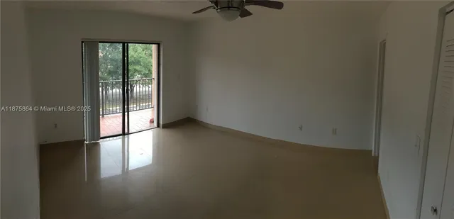 a view of a room that has a window in it