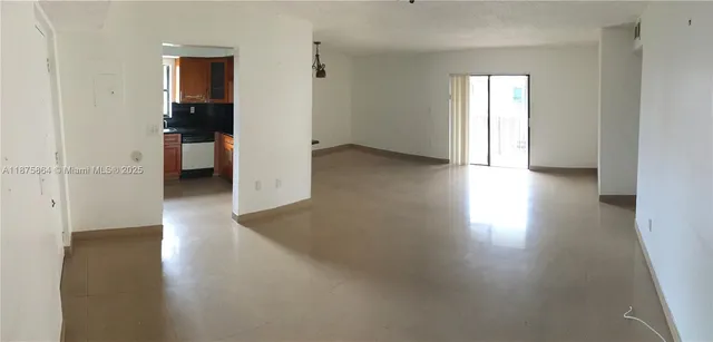 a view of a house with a yard and a garden