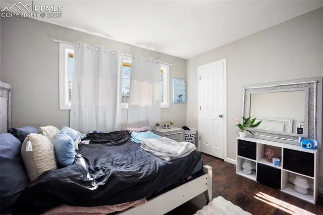 a bed room with a bed and a couch