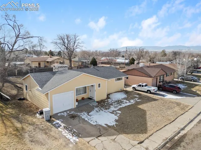 a view of a house with a snow
