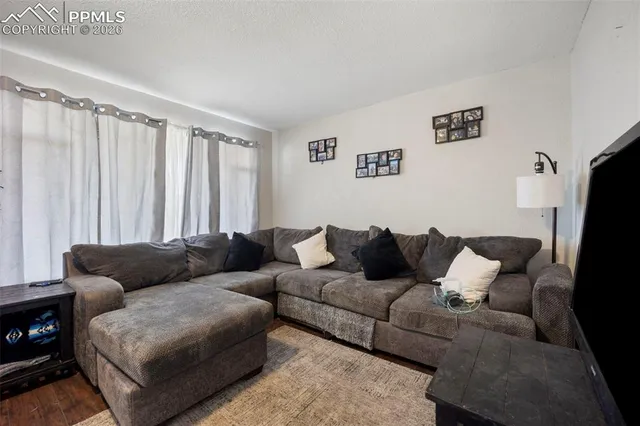 a living room with furniture and a couch