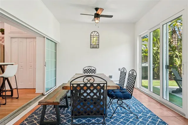 a kitchen with stainless steel appliances a white cabinets and stove top oven