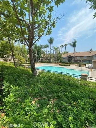 a view of a yard in front of the house