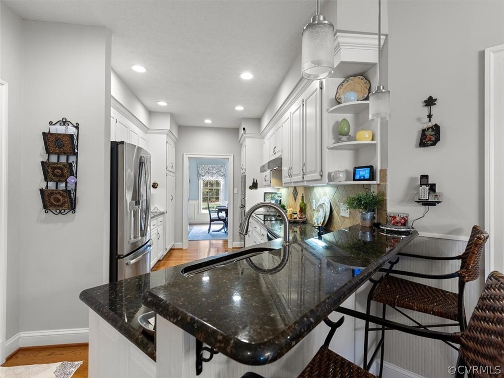 13030 River Road Chesterfield, VA 23838 - Photo 19 of 50 a room with table chairs and appliances