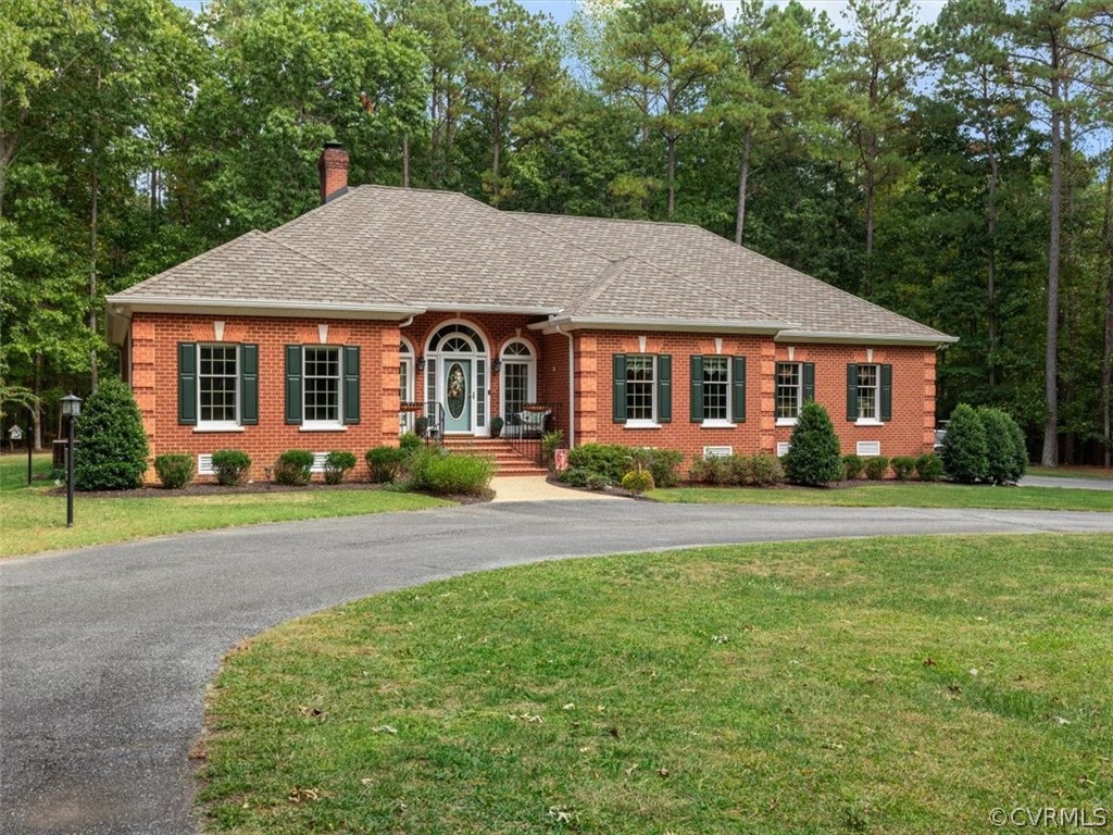 13030 River Road Chesterfield, VA 23838 - Photo 4 of 50 front view of a house with a yard
