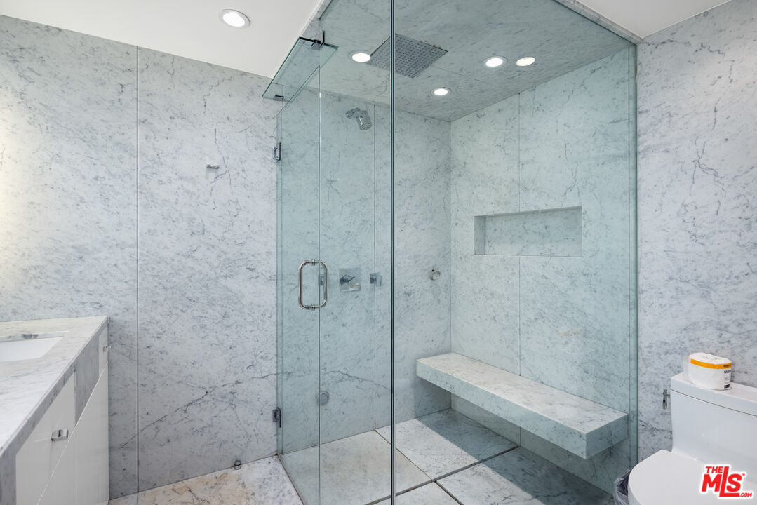 1000 Stradella Road Los Angeles, CA 90077 - Photo 13 of 45 a bathroom with a shower and a toilet