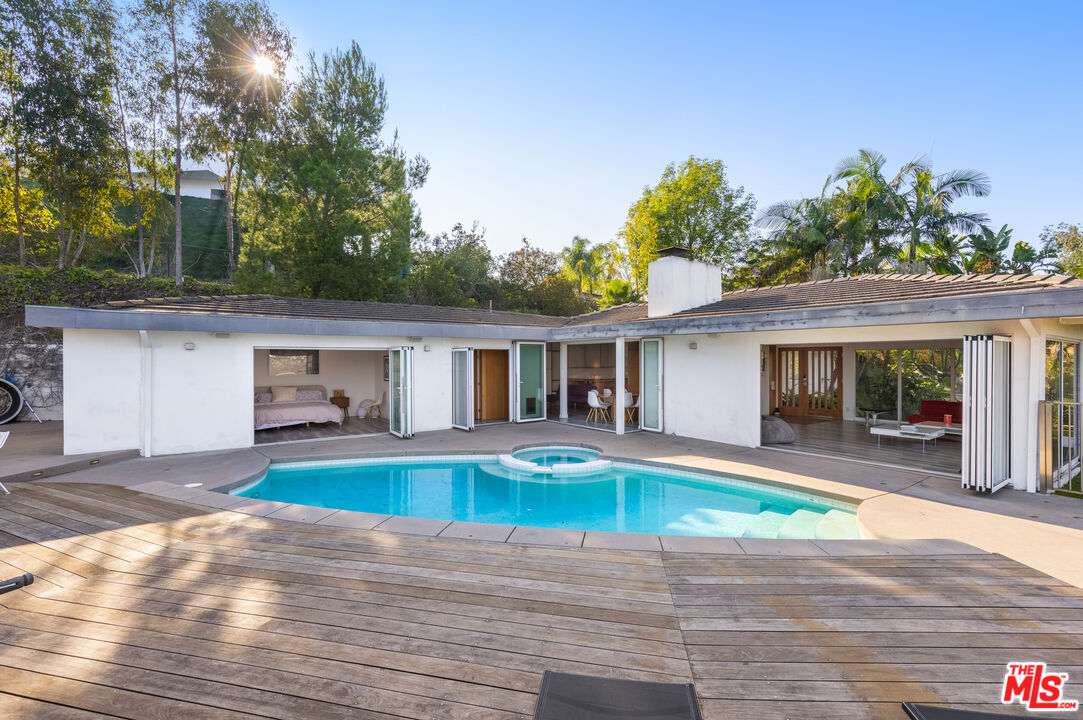 1000 Stradella Road Los Angeles, CA 90077 - Photo 29 of 45 a front view of house with yard outdoor seating and barbeque oven