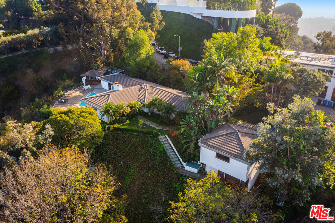 1000 Stradella Road Los Angeles, CA 90077 - Photo 42 of 45 an aerial view of a house with a yard swimming pool and outdoor seating