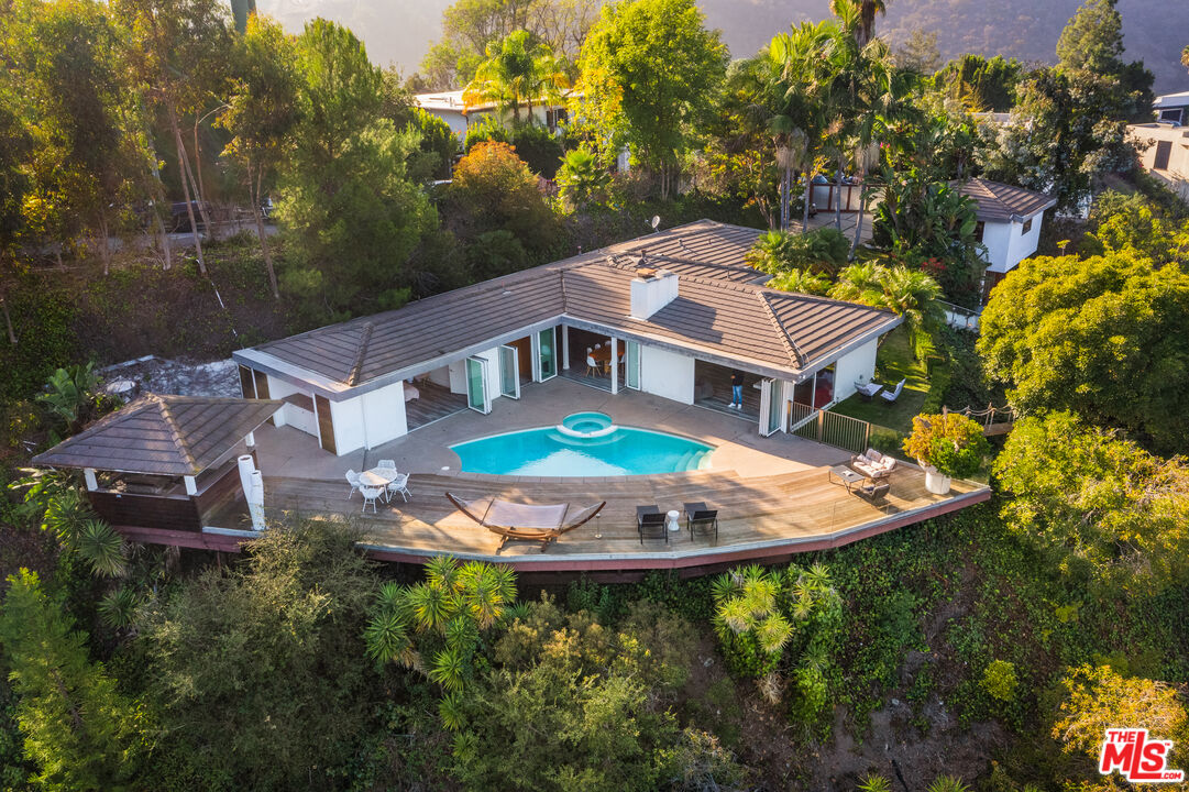 1000 Stradella Road Los Angeles, CA 90077 - Photo 43 of 45 an aerial view of a house with a garden and lake view