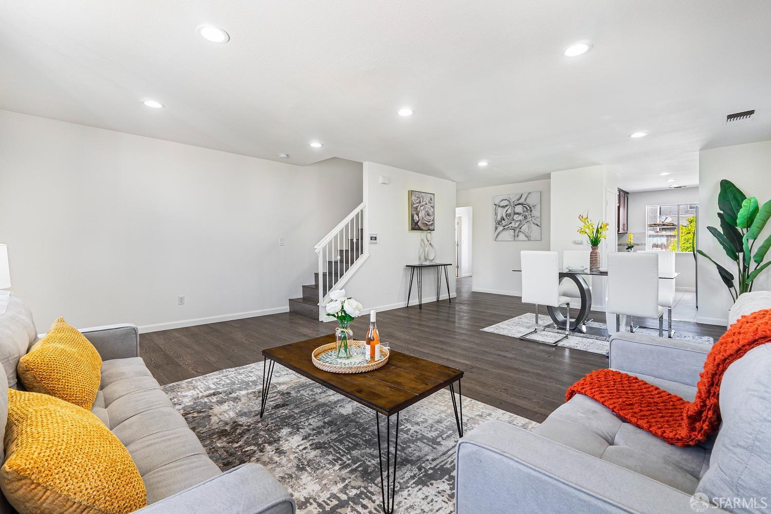 117 Malcolm Drive Richmond, CA 94801 - Photo 13 of 37 a living room with furniture and wooden floor