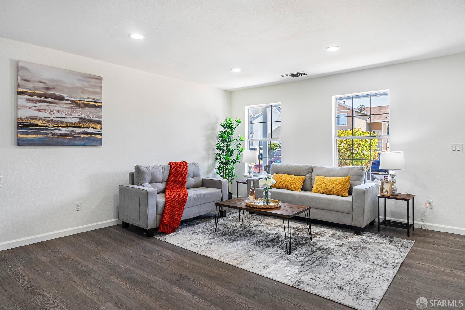 117 Malcolm Drive Richmond, CA 94801 - Photo 14 of 37 a living room with furniture and wooden floor