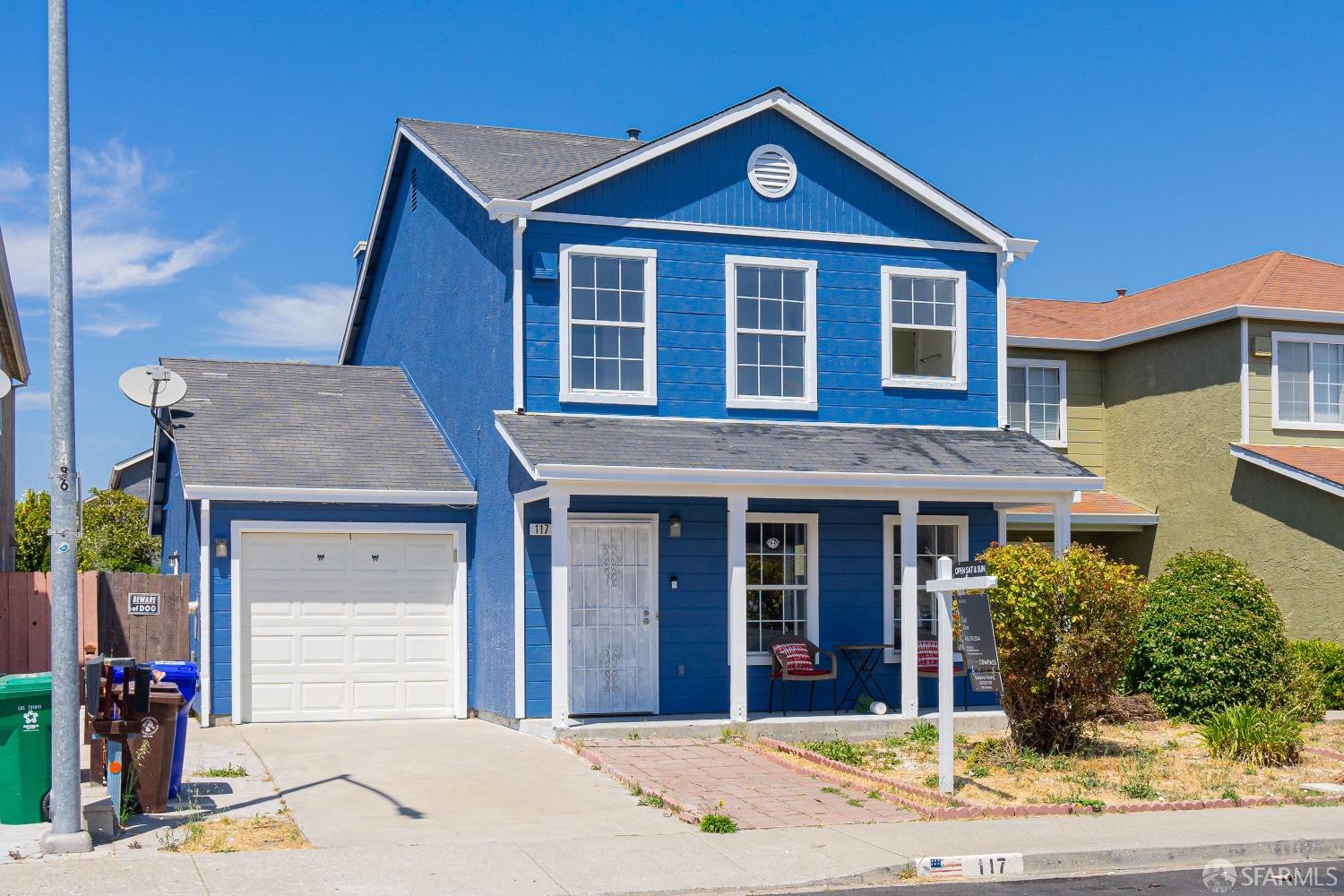 117 Malcolm Drive Richmond, CA 94801 - Photo 2 of 37 a front view of a house with a yard