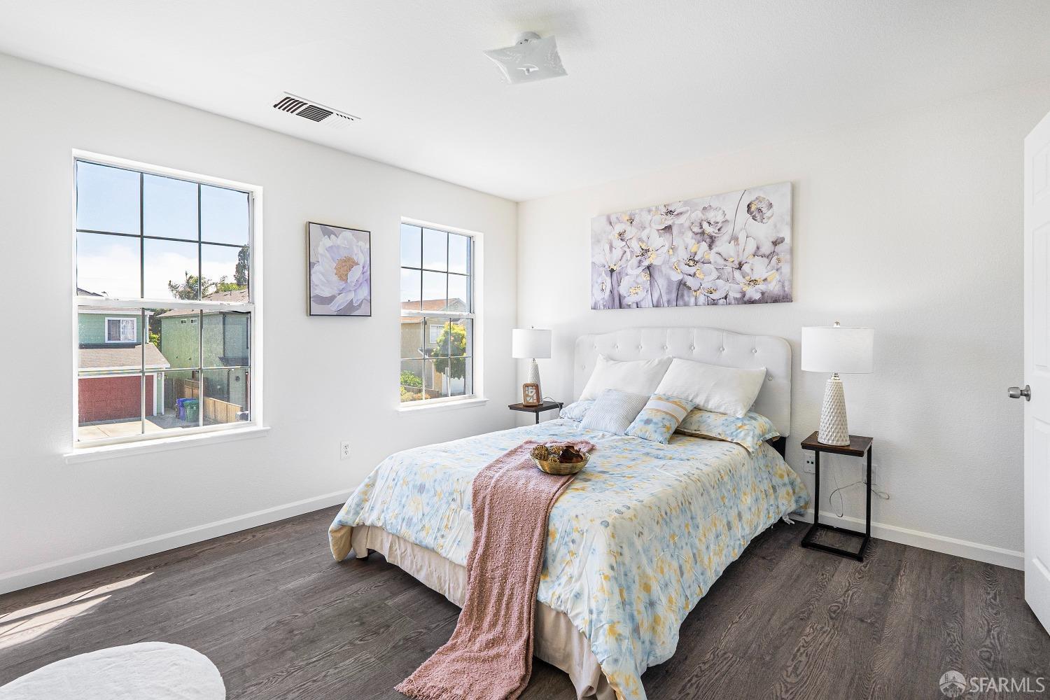 117 Malcolm Drive Richmond, CA 94801 - Photo 22 of 37 a bedroom with a bed and window