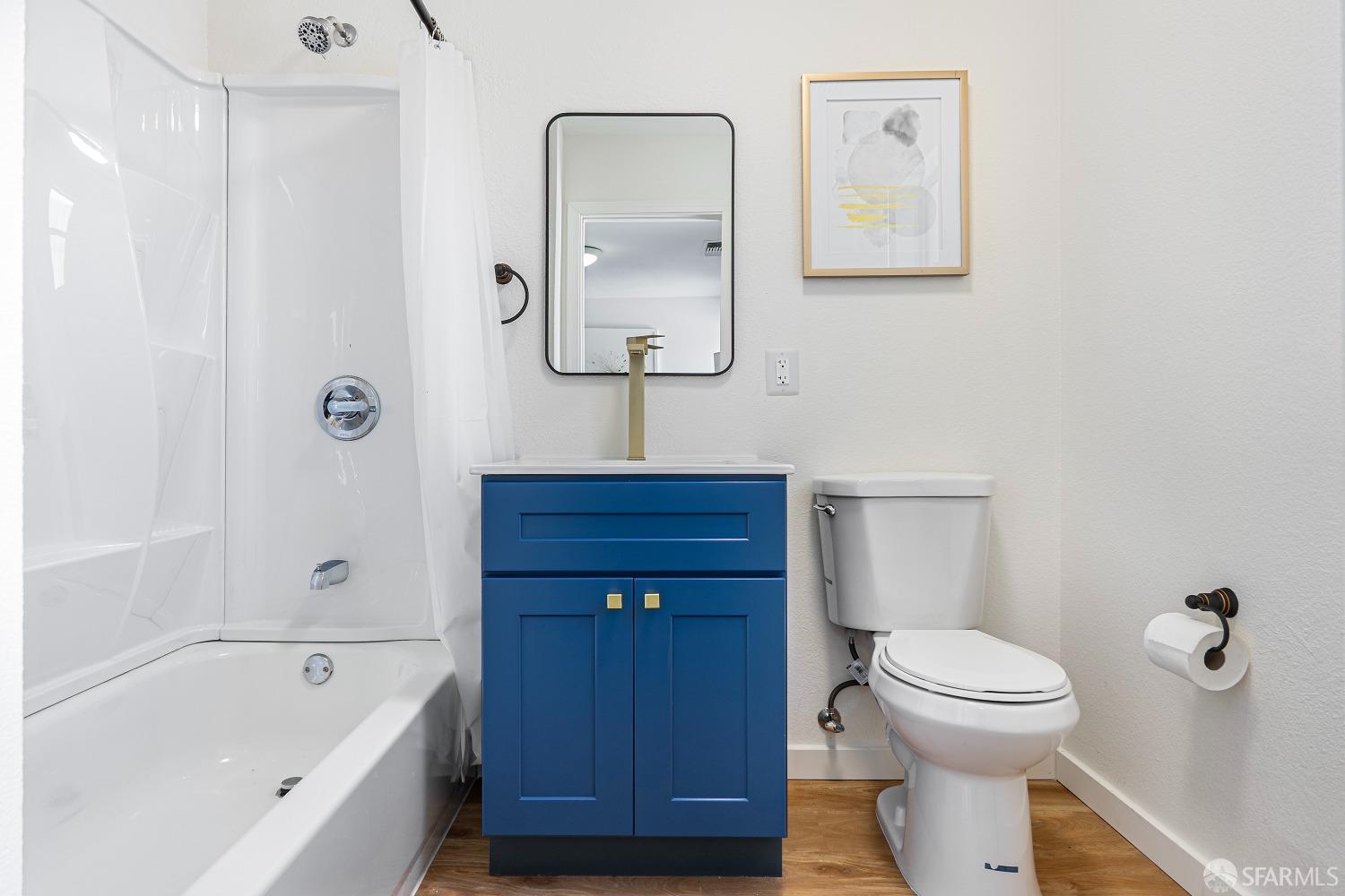 117 Malcolm Drive Richmond, CA 94801 - Photo 29 of 37 a bathroom with a toilet a sink and bathtub