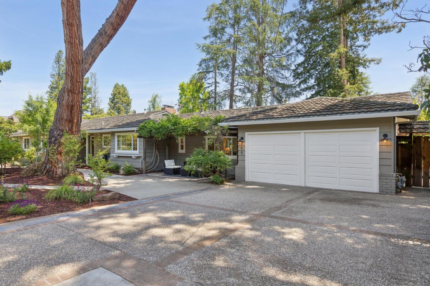 755 Santa Rita Avenue Los Altos, CA 94022 - Photo 2 of 50 a view of a house with a yard and garage