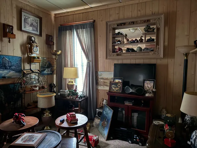 a kitchen with a table and chairs in it