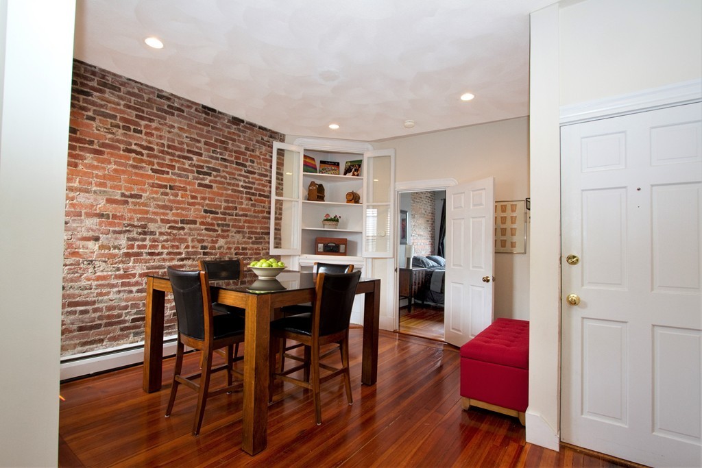 25 Sullivan Street, Unit 3 Boston, MA 02129 - Photo 2 of 13 a dining room with furniture and wooden floor