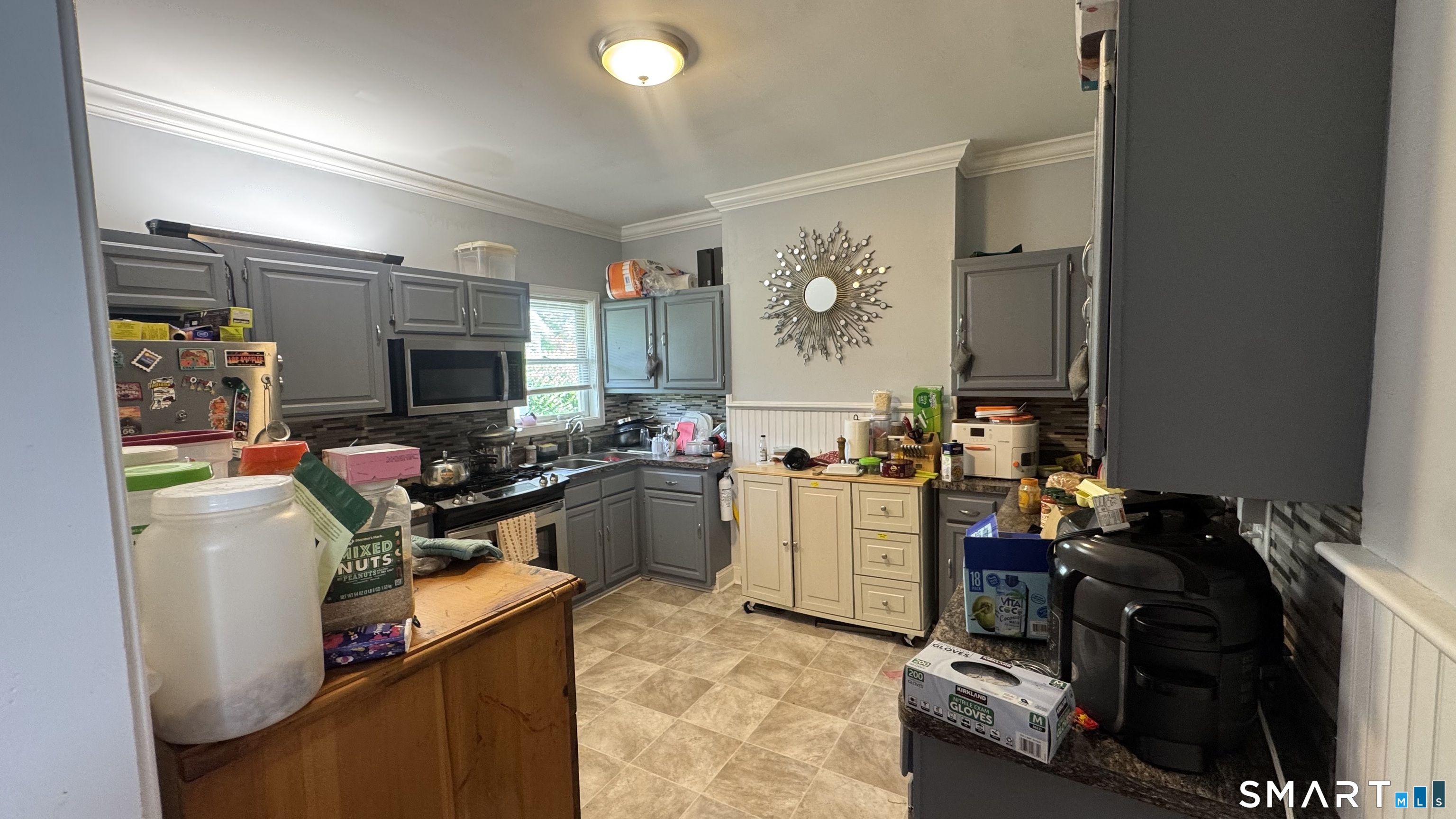 104 Prospect Street Ansonia, CT 06401 - Photo 31 of 40 a room with storage and utility