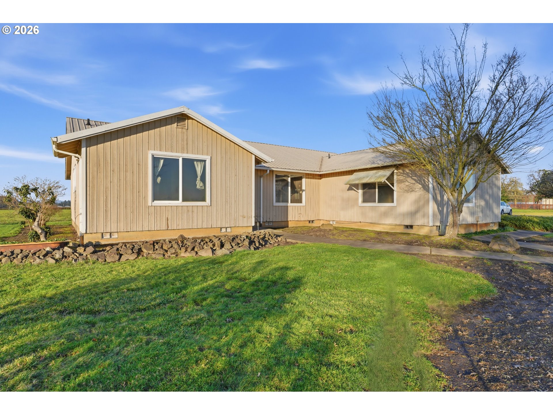 8949 South Gribble Road Canby, OR 97013 - Photo 2 of 36 a house view with a backyard space