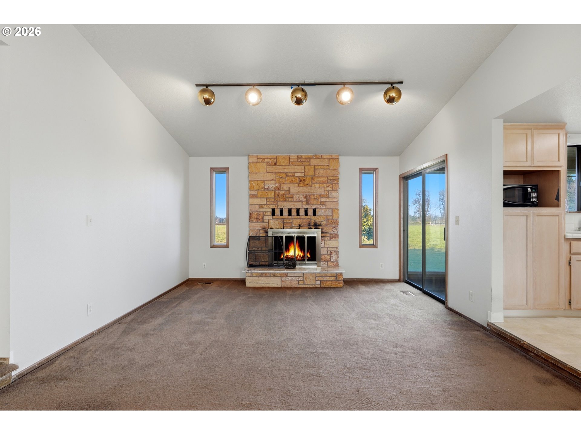 8949 South Gribble Road Canby, OR 97013 - Photo 21 of 36 a view of an empty room with a window