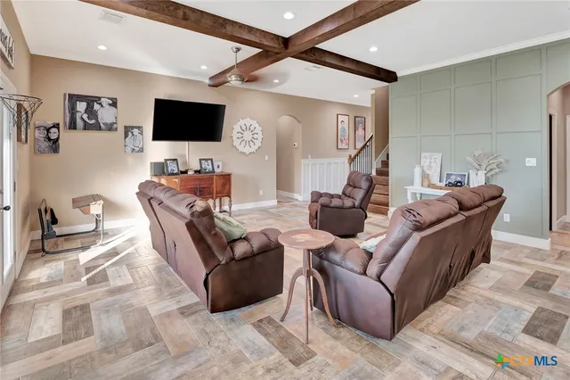 a kitchen with a stove a sink and a refrigerator
