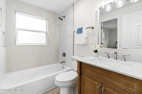 a bathroom with a bathtub